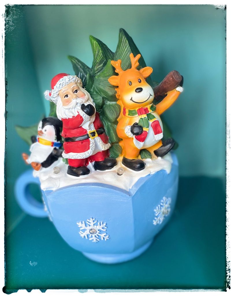 Santa and friends in teacup